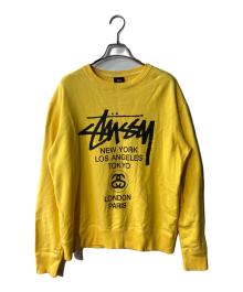 stussy（ステューシー）の古着「World Tour Crew ロゴスウェット」｜イエロー
