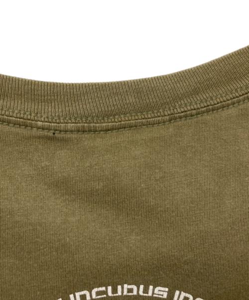 CYGNUS（シグナス）CYGNUS (シグナス) ミュージックプリントTシャツ オリーブ サイズ:Lの古着・服飾アイテム