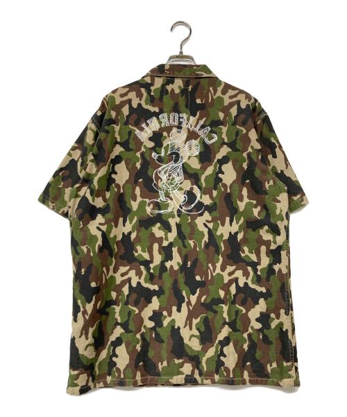 X-LARGE（エクストララージ）X-LARGE (エクストララージ) DISNEY (ディズニー) ディズニーコラボ カモ柄半袖シャツ グリーン サイズ:XLの古着・服飾アイテム