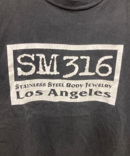 Hanes（ヘインズ）Hanes (ヘインズ) プリントTシャツ ブラック サイズ:Lの古着・服飾アイテム