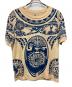 DISNEY（ディズニー）の古着「タトゥー柄ムービーTシャツ」｜ネイビー×ベージュ
