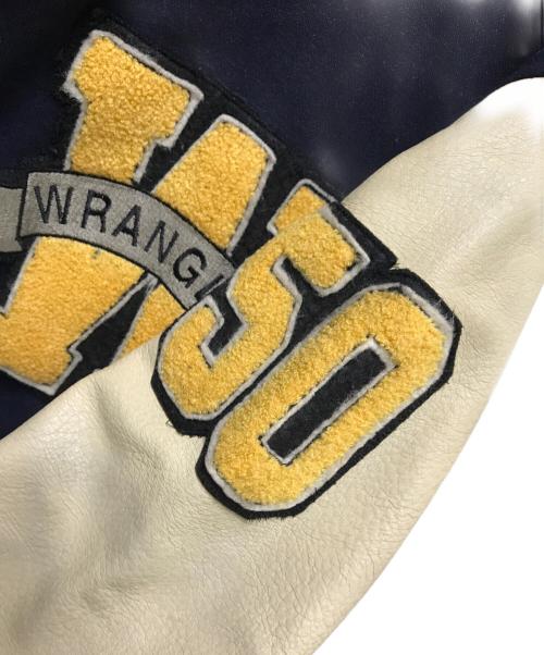 Wrangler（ラングラー）Wrangler (ラングラー) 袖レザーワッペンスタジャン ネイビー×ベージュ サイズ:Mの古着・服飾アイテム