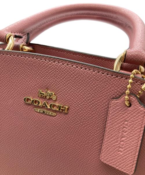 COACH（コーチ）COACH (コーチ) 2WAYミニキャリーバッグ ピンクの古着・服飾アイテム