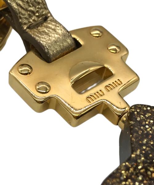 MIU MIU（ミュウミュウ）MIU MIU (ミュウミュウ) スターラメバックチャームキーホルダー ゴールドの古着・服飾アイテム