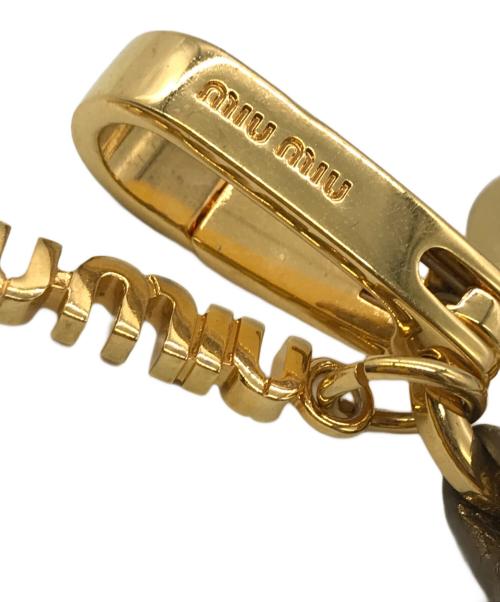 MIU MIU（ミュウミュウ）MIU MIU (ミュウミュウ) スターラメバックチャームキーホルダー ゴールドの古着・服飾アイテム