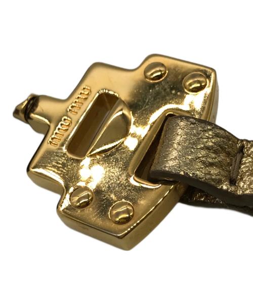 MIU MIU（ミュウミュウ）MIU MIU (ミュウミュウ) スターラメバックチャームキーホルダー ゴールドの古着・服飾アイテム