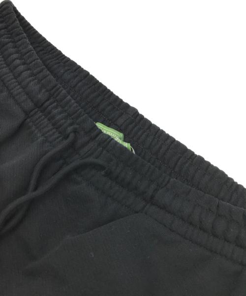 Denim Tears（デニムティアーズ）Denim Tears (デニムティアーズ) COTTON WREATH SWEAT FLARE PANTS ブラック サイズ:Ｌの古着・服飾アイテム