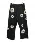Denim Tears（デニムティアーズ）の古着「COTTON WREATH SWEAT FLARE PANTS」｜ブラック