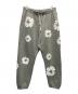 Denim Tears（デニムティアーズ）の古着「The Cotton Wreath Sweatpants」｜グレー