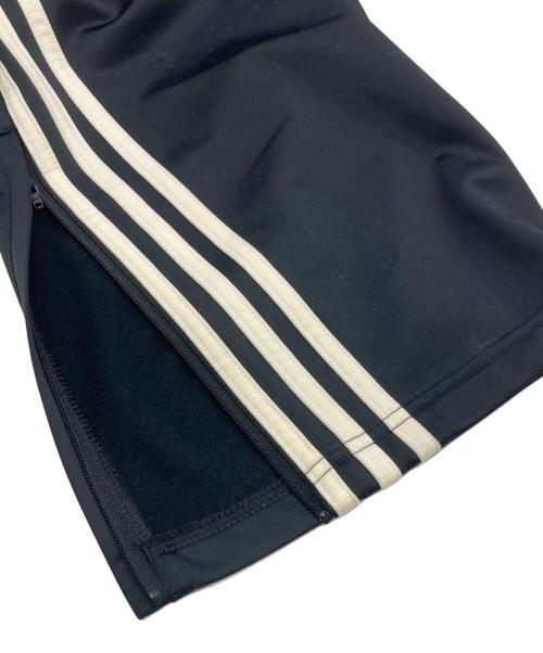 adidas（アディダス）adidas (アディダス) oasis (オアシス) ツアー ファイヤーバード トラックパンツ ブラック サイズ:Mの古着・服飾アイテム
