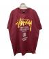 stussy（ステューシー）の古着「ワールドツアープリントTシャツ」｜レッド