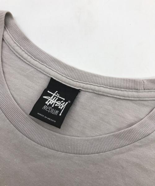 stussy（ステューシー）stussy (ステューシー) ツアーロゴTシャツ グレー サイズ:Mの古着・服飾アイテム