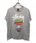 stussy（ステューシー）の古着「ツアーロゴTシャツ」｜グレー