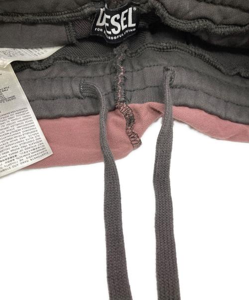 DIESEL（ディーゼル）DIESEL (ディーゼル) P-MARTAINOFFクラッシュ加工パンツ ピンク サイズ:Mの古着・服飾アイテム