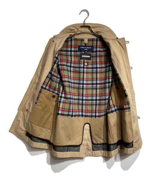 COMME des GARCONS HOMME（コムデギャルソン オム）COMME des GARCONS HOMME GOLDWIN (ゴールドウイン) WINDSTOPPER ステンカラーコート/コート」は、英語では WINDSTOPPER Balmacaan Coat ベージュ サイズ:XSの古着・服飾アイテム