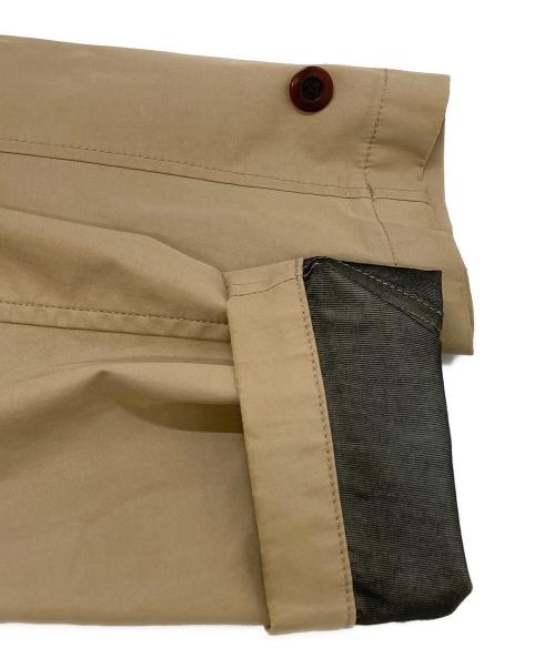 COMME des GARCONS HOMME（コムデギャルソン オム）COMME des GARCONS HOMME GOLDWIN (ゴールドウイン) WINDSTOPPER ステンカラーコート/コート」は、英語では WINDSTOPPER Balmacaan Coat ベージュ サイズ:XSの古着・服飾アイテム