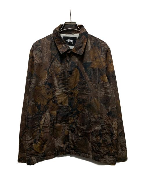 stussy（ステューシー）stussy (ステューシー) リアルツリーカモコーチジャケット ブラウン サイズ:Mの古着・服飾アイテム
