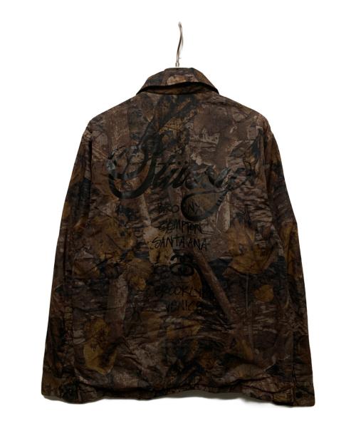 stussy（ステューシー）stussy (ステューシー) リアルツリーカモコーチジャケット ブラウン サイズ:Mの古着・服飾アイテム