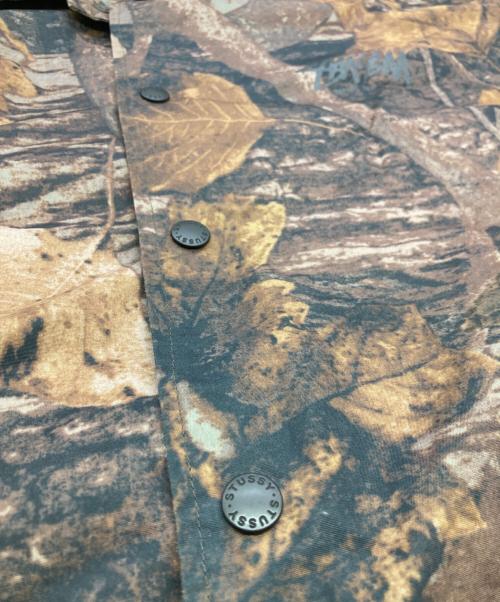 stussy（ステューシー）stussy (ステューシー) リアルツリーカモコーチジャケット ブラウン サイズ:Mの古着・服飾アイテム