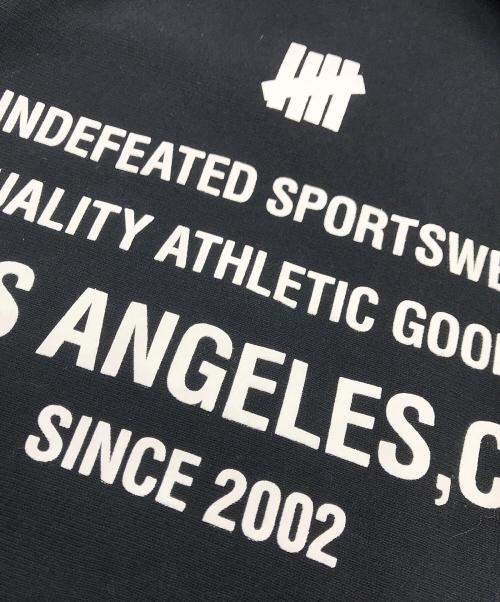 Champion（チャンピオン）Champion (チャンピオン) UNDEFEATED (アンディフィーテッド) リバースウィーブスウェット ブラック サイズ:XLの古着・服飾アイテム