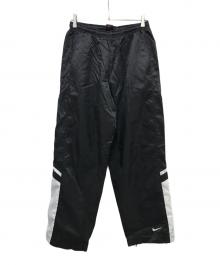 NIKE（ナイキ）の古着「ナイロントラックパンツ」｜ブラック