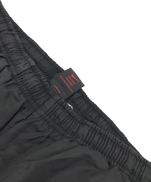 NIKE（ナイキ）NIKE (ナイキ) ナイロントラックパンツ ブラック サイズ:Mの古着・服飾アイテム