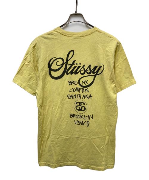 stussy（ステューシー）stussy (ステューシー) ワールドツアーTシャツ イエロー サイズ:Mの古着・服飾アイテム