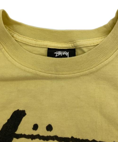 stussy（ステューシー）stussy (ステューシー) ワールドツアーTシャツ イエロー サイズ:Mの古着・服飾アイテム