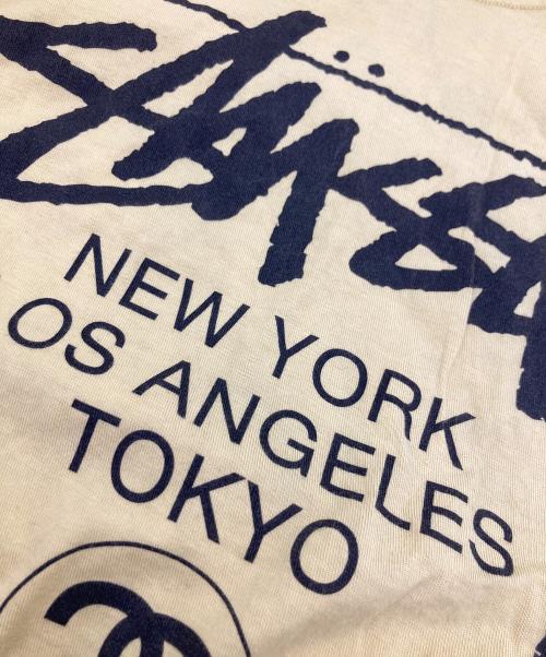 stussy（ステューシー）stussy (ステューシー) ワールドツアーTシャツ イエロー サイズ:Mの古着・服飾アイテム