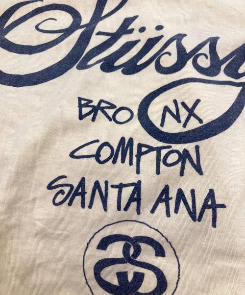 stussy（ステューシー）stussy (ステューシー) ワールドツアーTシャツ イエロー サイズ:Mの古着・服飾アイテム