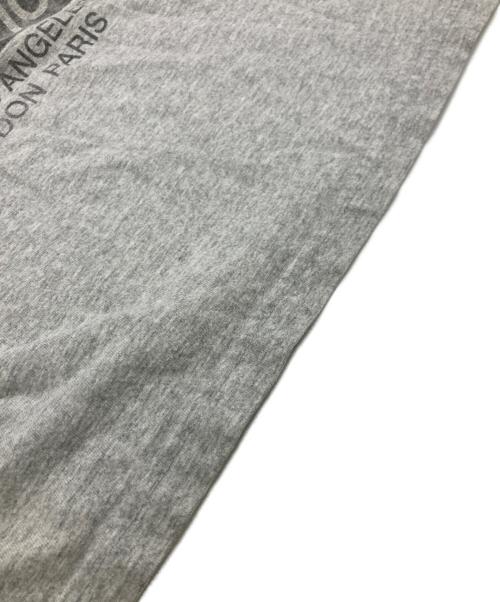 stussy（ステューシー）stussy (ステューシー) 縦ロゴインターナショナルTシャツ グレー サイズ:Sの古着・服飾アイテム
