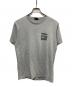 stussy（ステューシー）の古着「縦ロゴインターナショナルTシャツ」｜グレー