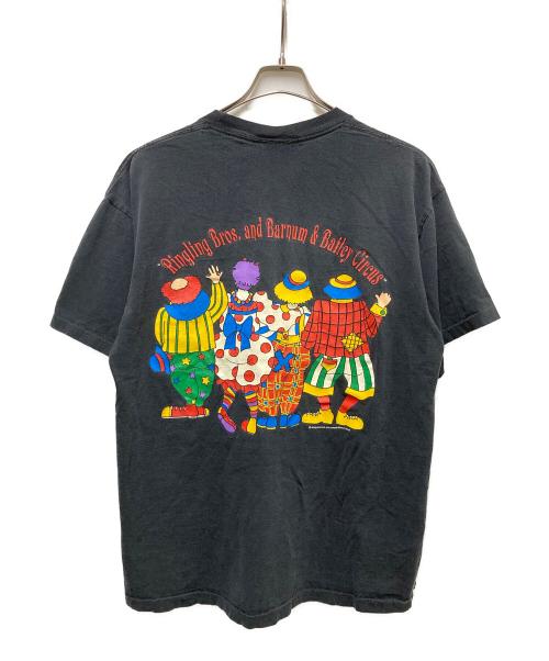 Ringling bros. and barnum&baily circus（リンリンブローズ アンドバーナムアンドバイリーサーカス）Ringling bros. and barnum&baily circus (リンリンブローズ アンドバーナムアンドバイリーサーカス) 90s サーカスプリントTシャツ ブラック サイズ:	SIZE XLの古着・服飾アイテム