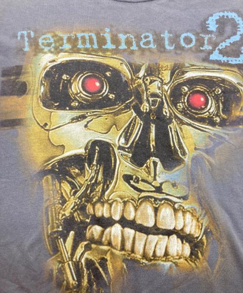 UNIVERSAL STUDIOS Hollywood（ユニバーサル・スタジオ・ハリウッド）UNIVERSAL STUDIOS Hollywood (ユニバーサル・スタジオ・ハリウッド) TERMINATOR2ムービープリントTシャツ グレー サイズ:MEDIUMの古着・服飾アイテム
