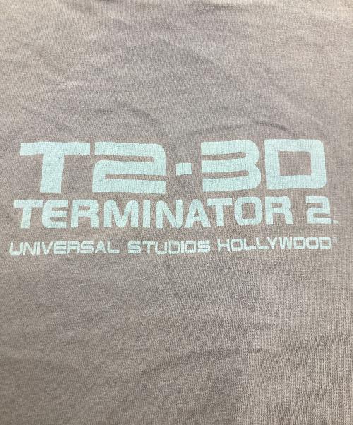 UNIVERSAL STUDIOS Hollywood（ユニバーサル・スタジオ・ハリウッド）UNIVERSAL STUDIOS Hollywood (ユニバーサル・スタジオ・ハリウッド) TERMINATOR2ムービープリントTシャツ グレー サイズ:MEDIUMの古着・服飾アイテム