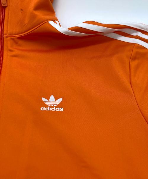 adidas（アディダス）adidas (アディダス) アディカラー クラシックス ファイヤーバード トラックトップ オレンジ サイズ:Lの古着・服飾アイテム