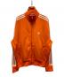 adidas（アディダス）の古着「アディカラー クラシックス ファイヤーバード トラックトップ」｜オレンジ