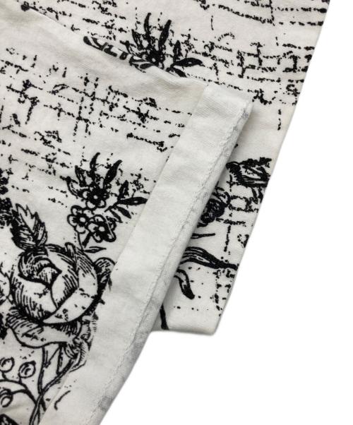 WILDWOOD PRODUETIONS（ワイルドウッドプロダクションズ）WILDWOOD PRODUETIONS (ワイルドウッドプロダクションズ) オールオーバープリントTシャツT ホワイト×ブラック サイズ:Lの古着・服飾アイテム