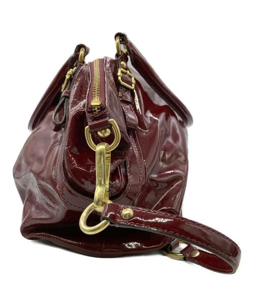 COACH（コーチ）COACH (コーチ) マディソン ソフィア パテント2wayバッグ レッドの古着・服飾アイテム