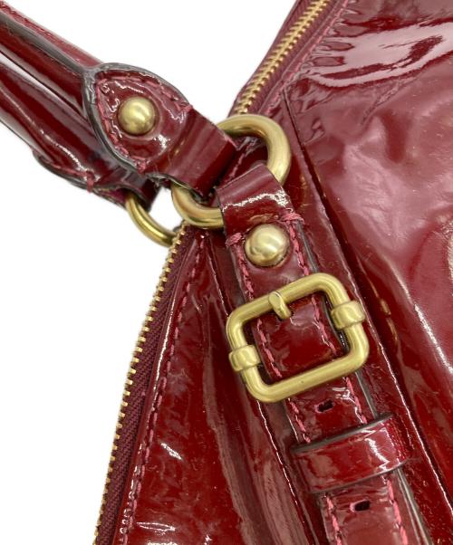 COACH（コーチ）COACH (コーチ) マディソン ソフィア パテント2wayバッグ レッドの古着・服飾アイテム