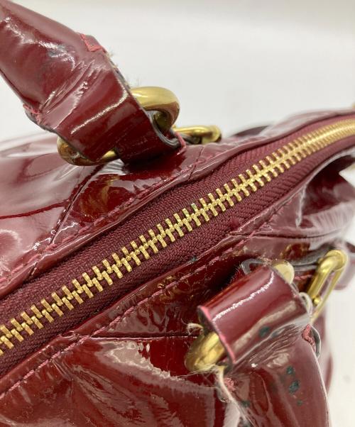 COACH（コーチ）COACH (コーチ) マディソン ソフィア パテント2wayバッグ レッドの古着・服飾アイテム