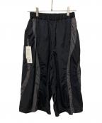 COOTIE PRODUCTIONSクーティープロダクツ）の古着「Nylon Shin Cut Wide Track Pants」｜ブラック