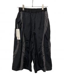 COOTIE PRODUCTIONS（クーティープロダクツ）の古着「Nylon Shin Cut Wide Track Pants」｜ブラック