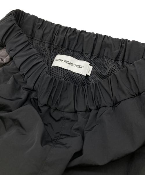 COOTIE PRODUCTIONS（クーティープロダクツ）COOTIE PRODUCTIONS (クーティープロダクツ) Nylon Shin Cut Wide Track Pants ブラック サイズ:	SIZE S 未使用品の古着・服飾アイテム