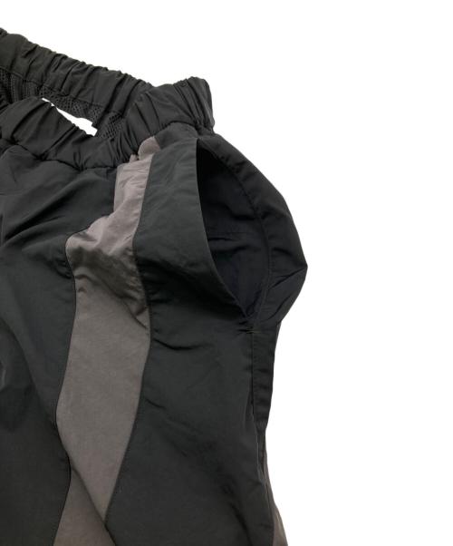 COOTIE PRODUCTIONS（クーティープロダクツ）COOTIE PRODUCTIONS (クーティープロダクツ) Nylon Shin Cut Wide Track Pants ブラック サイズ:	SIZE S 未使用品の古着・服飾アイテム