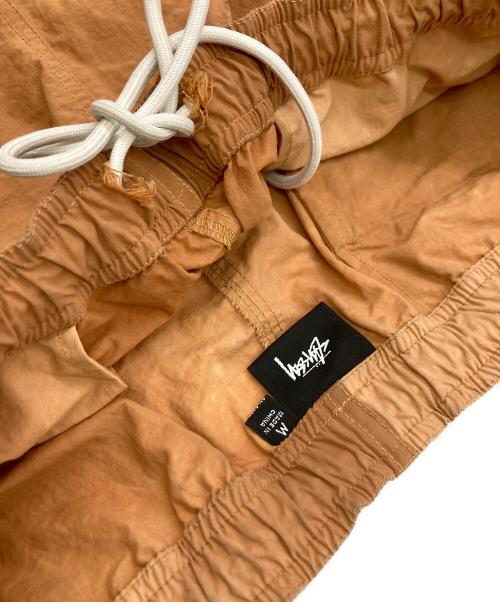 stussy（ステューシー）stussy (ステューシー) ナイロンハーフパンツ オレンジ サイズ:Mの古着・服飾アイテム