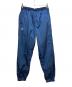 F.C.R.B.（エフシーレアルブリストル）の古着「BIG LOGO NYLON EASY PANTS」｜ネイビー