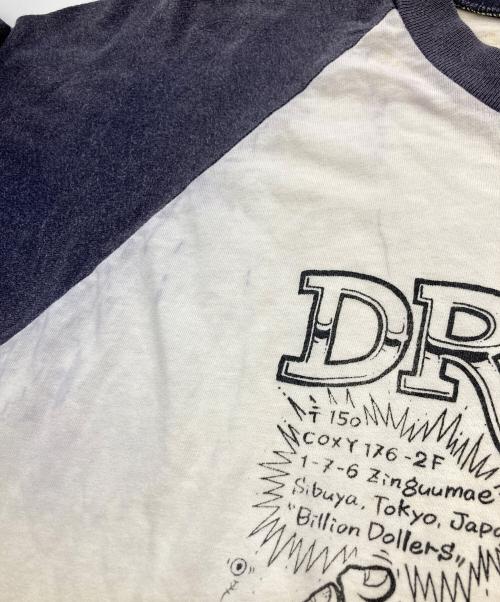 United Sports（ユナイテッドスポーツ）United Sports (ユナイテッドスポーツ) ed rothアートプリントラグランTシャツ ホワイト×ネイビー サイズ:Ｌの古着・服飾アイテム