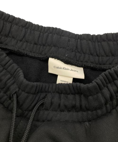 Calvin Klein Jeans（カルバンクラインジーンズ）Calvin Klein Jeans (カルバンクラインジーンズ) モノグラムフレンチテリージョガーパンツ ブラック サイズ:XSの古着・服飾アイテム