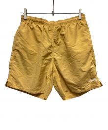 stussy（ステューシー）の古着「STOCK WATER SHORT」｜オレンジ